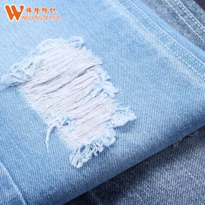 Cina Il peso massimo uniforme 14oz allunga il denim Jean Material Environmentally Friendly in vendita