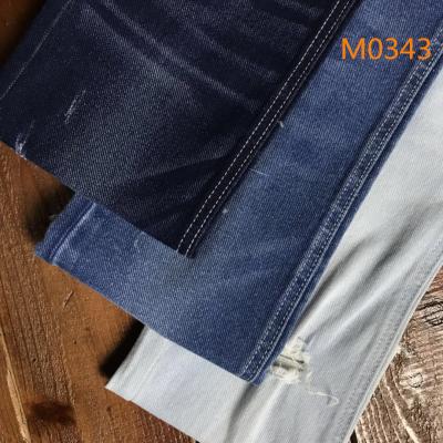 China 69 Cotton 29 Polyester 2 Spandex Dark Blue Jeans Raw Denim Fabric 11 Oz for sale