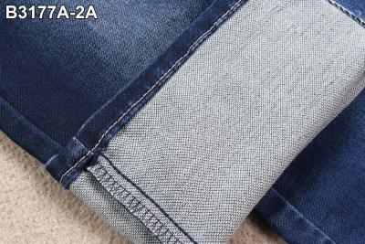 China Das 9,5 Unzen-dehnen gefälschte strickende Denim-Twill-Gewebe-Doppelschichten Jeans-Material aus zu verkaufen