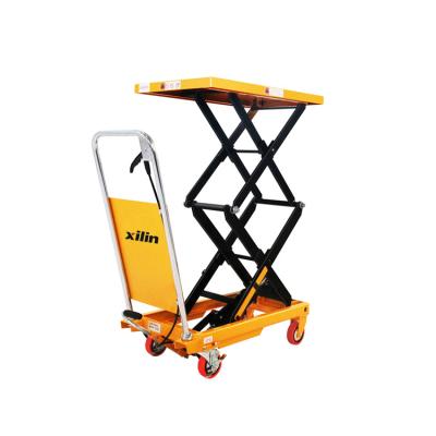 China Hotels Xilin UK Heavy Duty 350kg Manual Scissor Hydraulic Scissor Lift Table Trolley With Rear Guard for sale