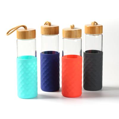 China New Design Best Selling Portable Fruit Juice Drinking Bottle Sustainable With Lid Glass Water Bottle for sale