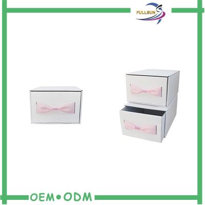 China Custom Logo Pink Cardboard Drawer Slide Packaging Boxes Clothes Gift Boxes With Bow for sale