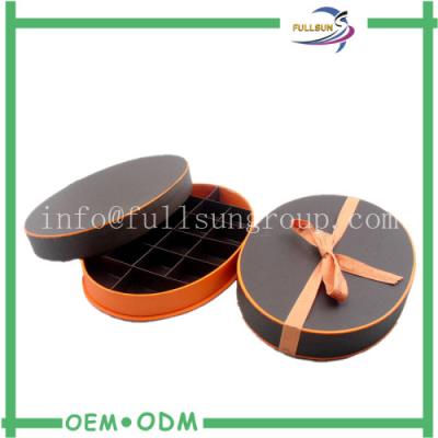 China Customized Cotton Ribbon Oval Chocolate Gift Boxes with Paper Divider for sale