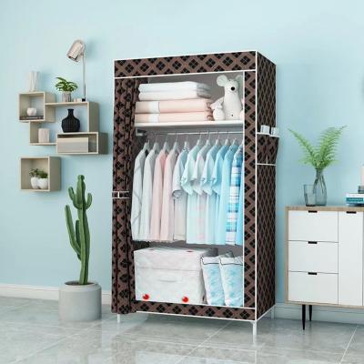 China Simple Fancy Modern Bedroom Fabric Portable Folding Metal Cheap Steel Wardrobe for sale