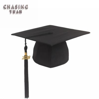 China Kids Costume School Uniforms Pattern Kindergarten Matte Black Graduation Cap School Uniforms With Tassel 2018 Years Graduation Charm for sale