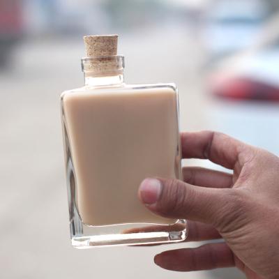 China Cis Wooden Bottle Cork Milk Tea Bottle Coffee Juice Glass Bottle Glass Beverage Fashion Bottle for sale