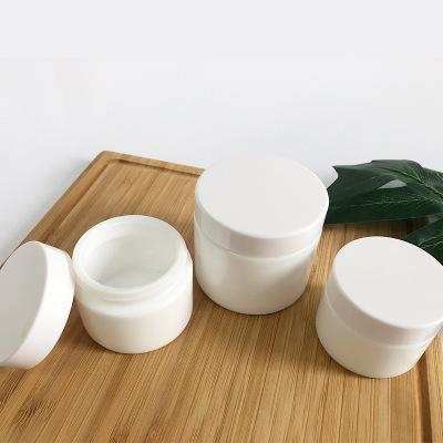 China High End White 15 30 50 Porcelain 100g Personal Care Glass Eye Cream Cosmetic Jars Jars Facial Mask Cream Jars for sale