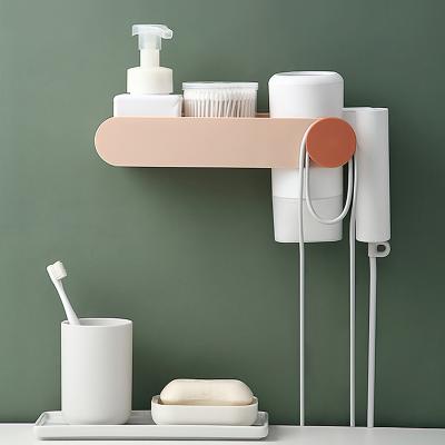 China Hot Sustainable Long Style Bathroom Multifunctional Hair Dryer Rack Wall Mounted Seamless Storage Rack for sale