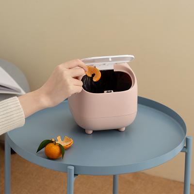 China Durable Hand Press Household Trash Can Mini Plastic Mini Countertop Lid Car Desktop Trash Can Set Trash Can Desktop Reuse Plastic for sale