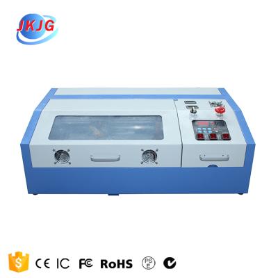 China Laser Engraving Low Moq 3020 Glass Bottle Silicone Wristband Laser Engraving Machine Laser Engraving Machine Color for sale