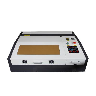 China Laser Engraving K40 Mini Name Tag Plastic Engraving Machine For Rubber Stamp Carving 3020 4040 With USB for sale