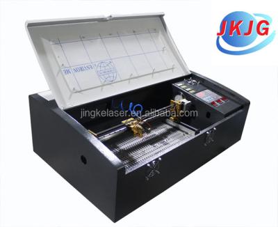 China Laser Engraving Wallet 40w Mini Laser Engraving Machine For Customized Mobile Laser Engraving Machine for sale