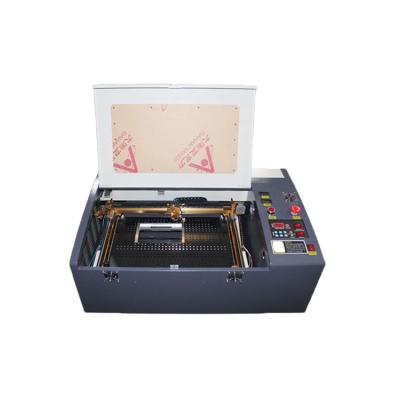 China Laser Engraving mini laser engraving machine 40w 50w 3020 300*200mm laser cutting machine with small MOQ low price for sale