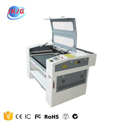 China Laser Engraving Portable Laser Engraving Machine Portable Jeans CO2 100W Laser Engraving Cutting Machine Intelligent Engraver 40W for sale