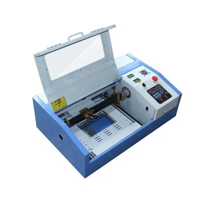 China 3020 Acrylic Laser CUT Low Moq Fabric ID Plate Laser Cutting Machine MDF for sale