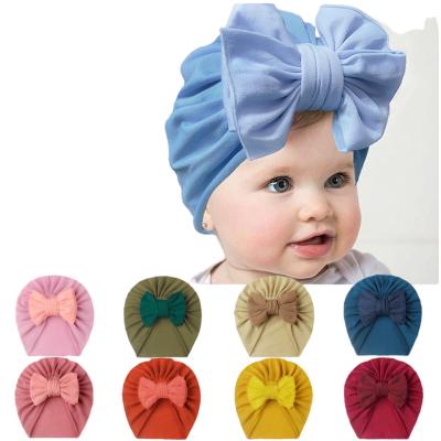 China New Breathable Baby Turban Baby Hat Bow Baby Solid Color Knot Sweater Hat for sale