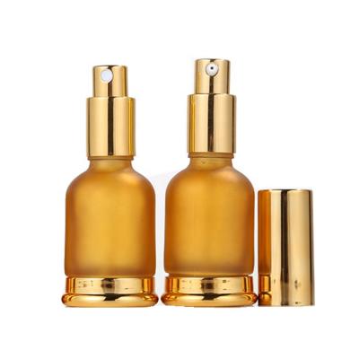 China New Product Personal Packaging Skin Care Volume Glass Bottle Different With Gold Bottom Essential Oil Cosmetic Amber Glass Bottle for sale