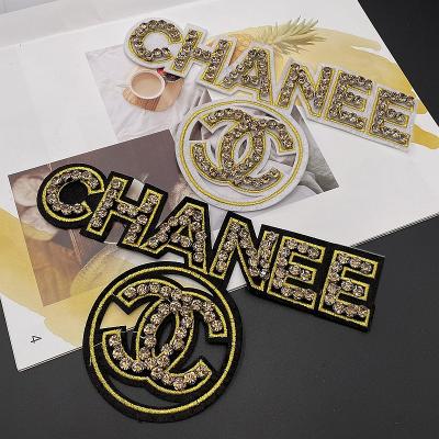 China 2021 hot sale fashionable 3D beaded patches rhinestone letter patches bordado en pedreria for sale