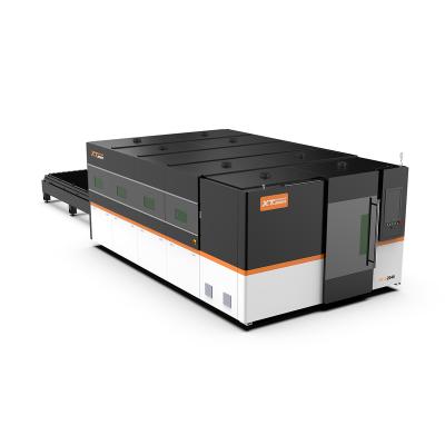 China 2000w 3000w 6000w cover device stainless steel water cooled laser cutting machine with exchange table for sale