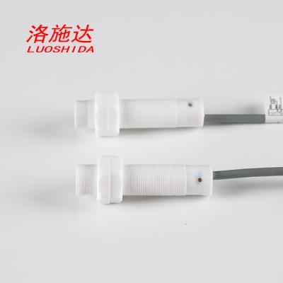 China Sensor de proximidad capacitivo de la resistencia a la corrosión de PTFE M18 10-30VDC para la medida llana líquida en venta