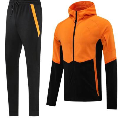 China Comfortable Breathable Quick Dry Latest National Football Uniform Set Orange Color Mens Jackets Tracksuits Equipments 2 Piece Jogger Fitness Set for sale