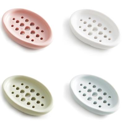 China Kitchen Reusable Creative Household Silicone Soap Box Daily Bathroom Products Soap Holder Drain Laundry Brush for sale