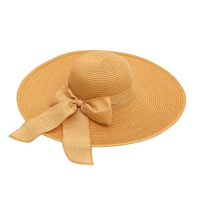 China Wholesale Striped Summer Beach Straw Hat Women Seaside Big Brim Sunscreen Vacation Leisure Sun Hat for sale