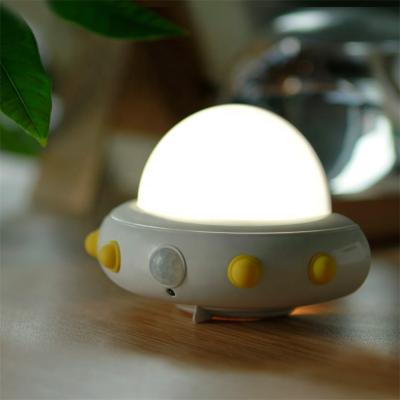 China Modern LED Cabinet Light Motion Activated Wireless Under Cabinet Motion Sensor Light UFO Night Light for sale