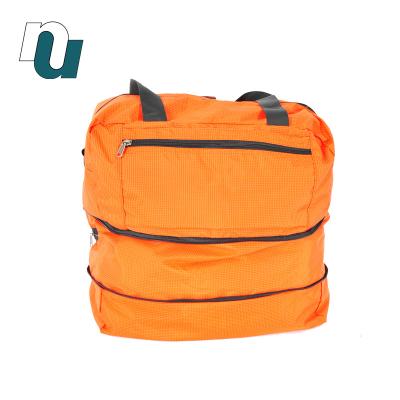 China Expandable to larger volume design casual carry unisex accessory bag new with expandable fashion travel nylon bag for man for sale