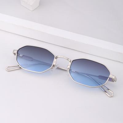 China 2021 New Fashion High Quality Small Frame Sunglasses Ladies Metal Irregular Sunglasses for sale