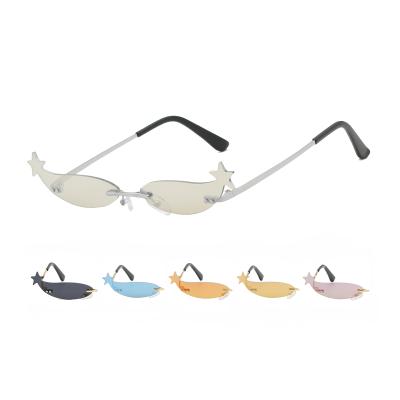 China Fashion Sunglasses Star Shaped Rimless Sunglasses Candy Color Transparent Eyewear for sale