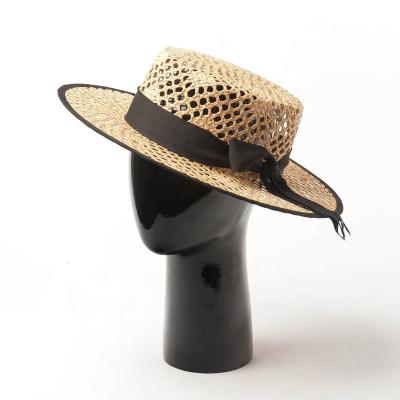 China 2022 New Product Luxury Character Fashion Overflow Black Hollow Sliver Flat Surface Women Beach Sun Protection Straw Hat for sale