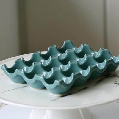 China Viable Supplier Kitchenware China 12 Pcs Colorful Elegant Porcelain Egg Racks for sale