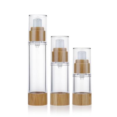 China Custom Cosmetic 20ml 30ml 50ml Clear Airless Pump Press Lotion Bottle With Bamboo Lid Airless Bamboo Cosmetic Cream Bottle for sale