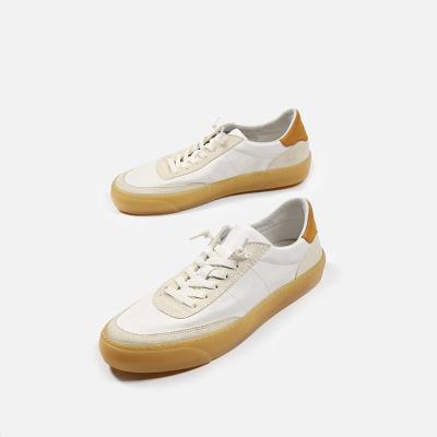 China Custom Unique White Flat Shoes Fashion Logo Outdoor Walking Style Rubber Skateboarding Shoes Cushioning Casual Shoes for sale