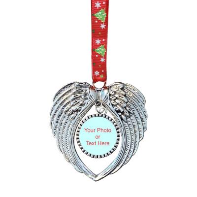 China 2021 Hot Selling Metal in Memory Angel Wings Christmas Tree Ornament Hanging Take Photo Bauble Backdrops Metal Ornaments Pendants for sale