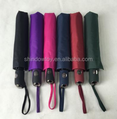 China New Design Solid Color 3 Folds American Umbrella Outdoor Raining Style Umbrella for sale