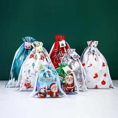 China Amazon Fashion Christmas Candy Bag Drawstrings Christmas Gift or Candy Bags with Card for sale