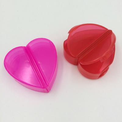 China New Eco-Friendly Rotating Small Pill Box Smart Pill Box Heart Smart Pill Box for sale