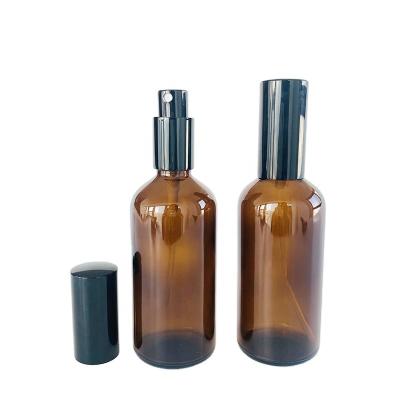 China Eco - Friendly 100ml Recyclable Empty Amber Glass Spray Perfume Bottle With Aluminum Black Spray Cap for sale