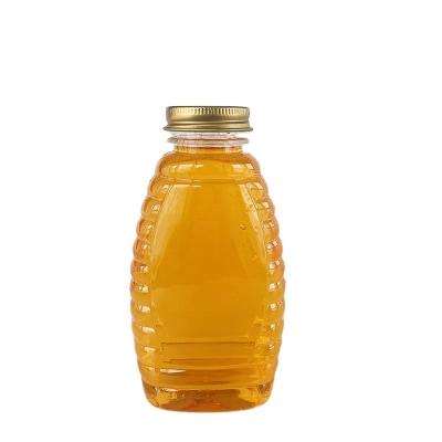 China 360ml PET Bottle 500g Plastic Transparent Plastic Honey Bottle Beverage Bottle With Aluminum Cap for sale