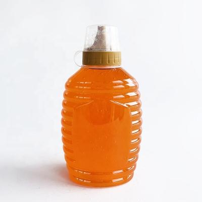 China Food Customized Food Grade 500ml Transparent Plastic Bottle Honey Packaging for sale