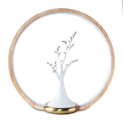 China Eco-friendly modern simple circular bedside lamp bedroom living room study art circle birthday gift for sale