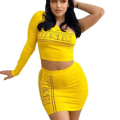 China QUICK DRY Fashionable Yellow Cotton One Shoulder Long Sleeve Women Crop Top Skirt Suit for sale