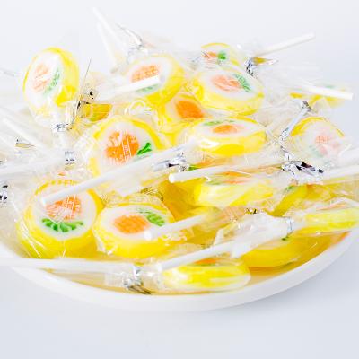 China Natural Clear Soft Hard Candy Lollipop Sticks With Safe Big Paper Wrapping Lollipop for sale