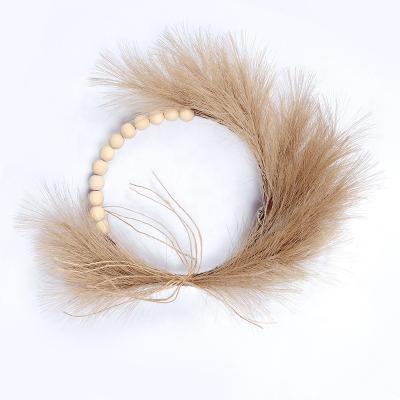 China New Home Decoration X351 Hot Sale Faux Pampas Grass Amazon Wood Bead Braids Wood Bead Artificial Pompas Grass Garland For Door Home Decoration for sale