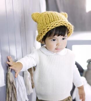 China Hand hook coarse wool cap children's horn curling hat new hat warm fashion headdress wholesale for sale