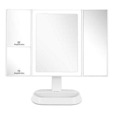 China 1x/5x/7x Free Standing Trifold Magnification Mirror Lighted Rotating Vanity Mirror With Led Lights for sale