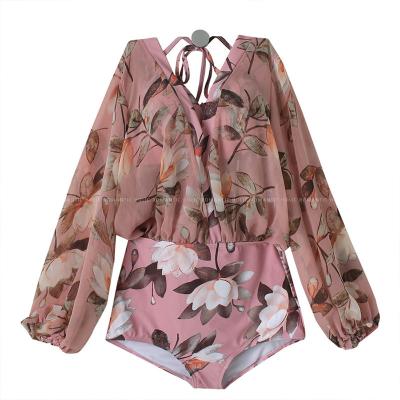 China Breathable Fashion Couples Swimwear Woman Printed Beach Dress Long Sleeves Sunscreen Swimsuit Women Beachwear for sale