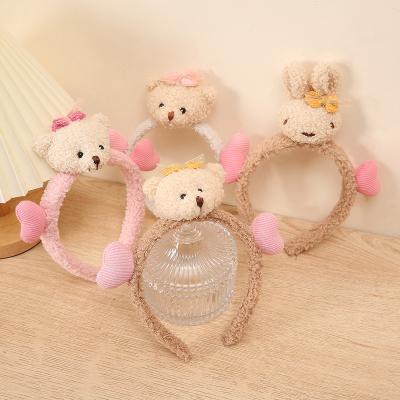 China 2022 version teddy bear love headband cartoon cute running bear headband net red female rabbit hair accessories wash makeup shower for sale